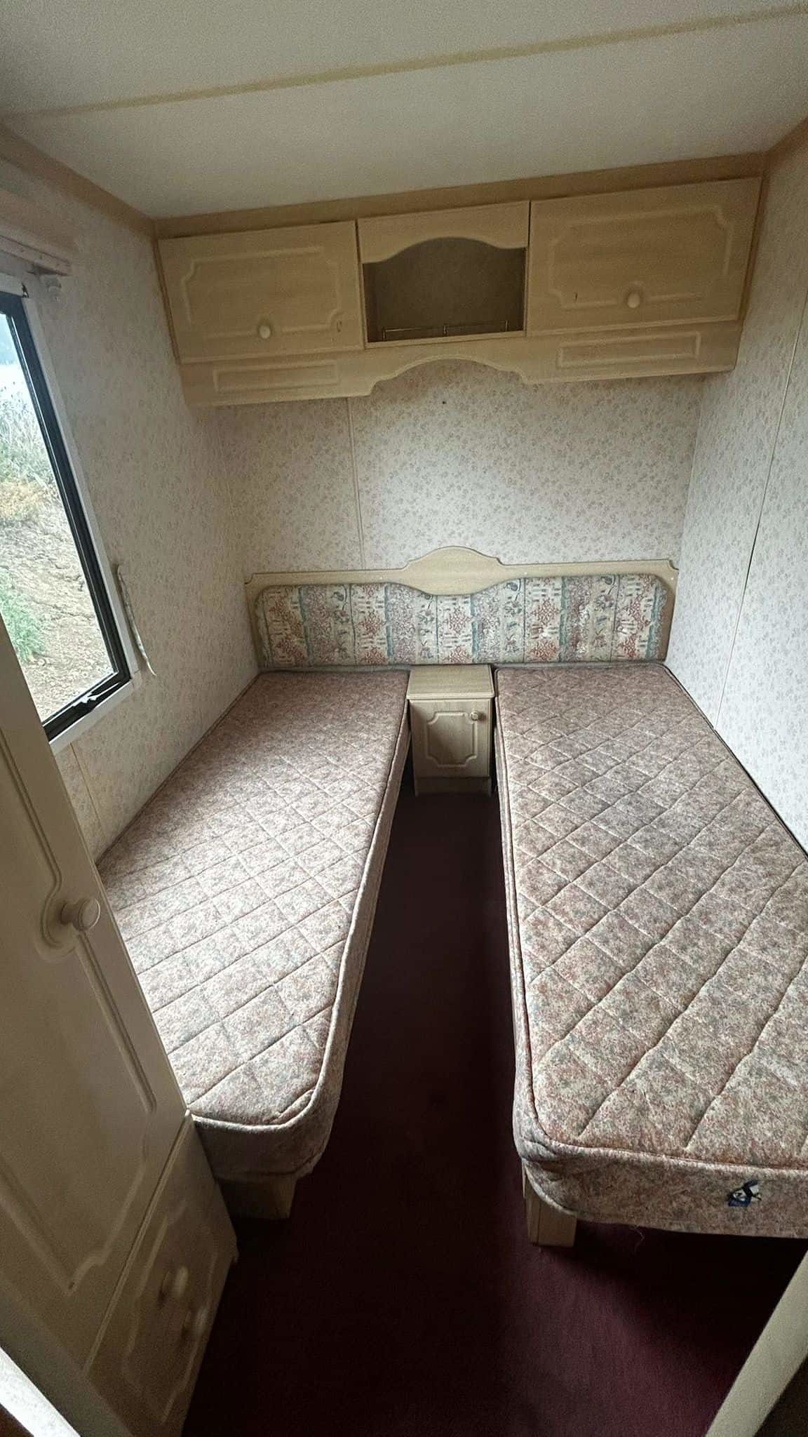 Two single beds in room